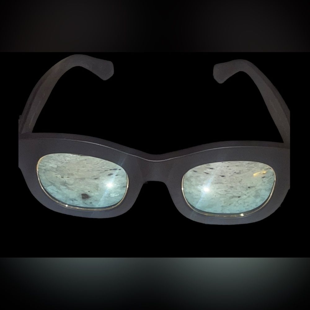 Illesteva Gold and black sunglasses, mirrored. Tighter fit.